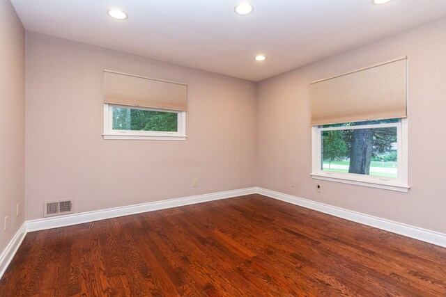 4345 Pine Tree Trl, Bloomfield Hills, MI 48302 - unfurnished room with healthy amount of natural light, recessed lighting, baseboards, and dark wood-style floors