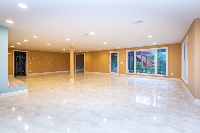 4345 Pine Tree Trl, Bloomfield Hills, MI 48302 - empty room featuring light marble finish floors, recessed lighting, and baseboards