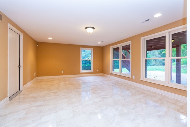 4345 Pine Tree Trl, Bloomfield Hills, MI 48302 - spare room with light marble finish flooring, baseboards, and recessed lighting