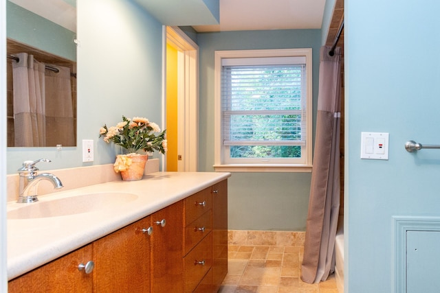 4345 Pine Tree Trl, Bloomfield Hills, MI 48302 - full bathroom with vanity, stone finish flooring, and shower / tub combo