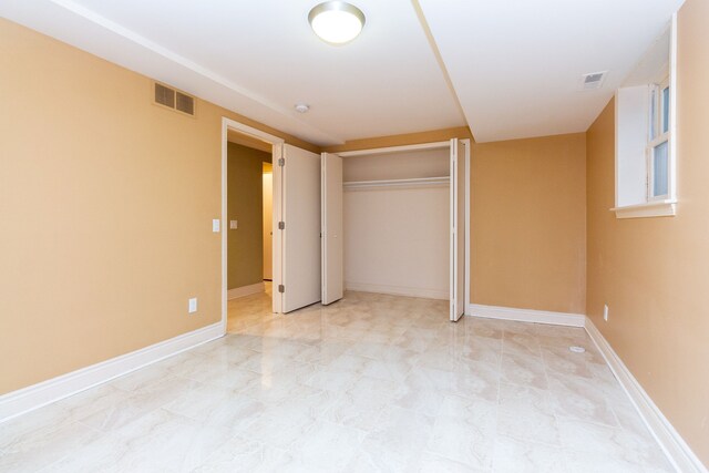 4345 Pine Tree Trl, Bloomfield Hills, MI 48302 - unfurnished bedroom featuring a closet and baseboards
