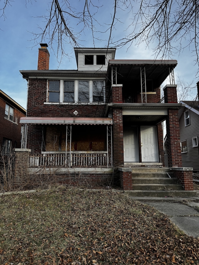 view of front of property featuring covered porch