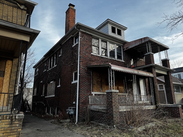 view of home's exterior featuring covered porch