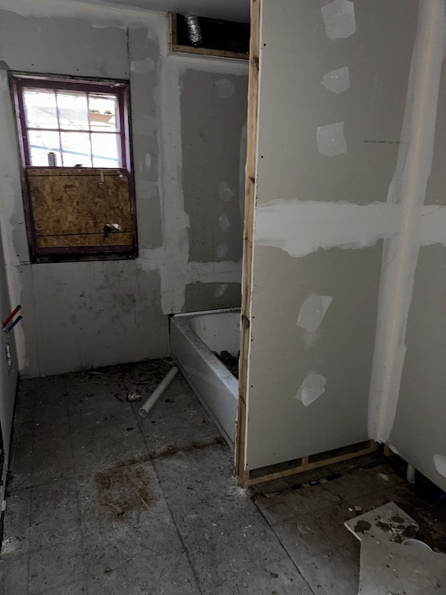 bathroom with a washtub