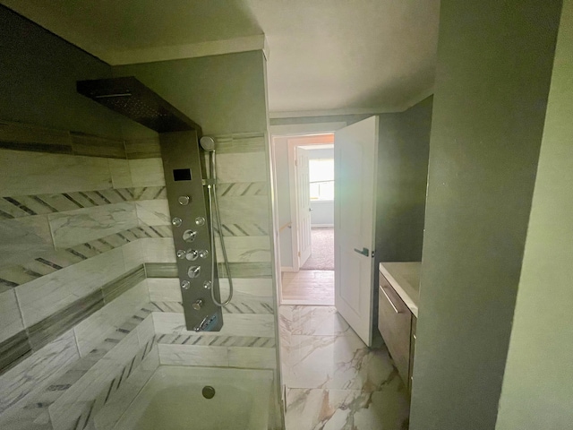 bathroom featuring tiled shower / bath combo