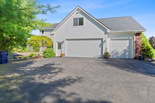 exterior space with a garage