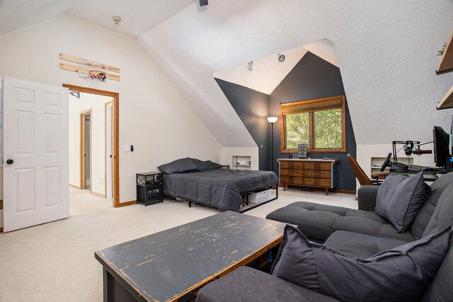 bedroom with light carpet and vaulted ceiling