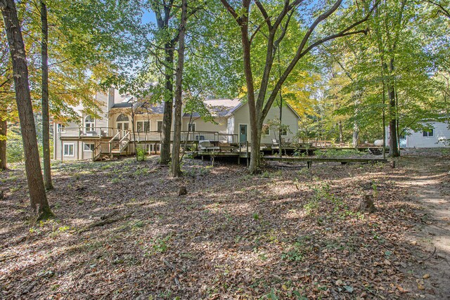 view of yard featuring a deck