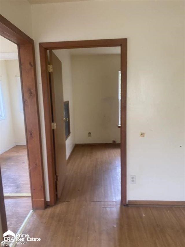 hallway featuring hardwood / wood-style flooring