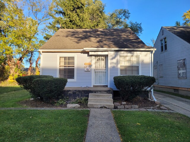 15836 Patton St, Detroit, MI 48223 - view of front of home featuring a front lawn
