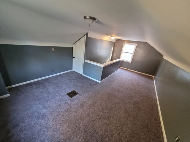 15836 Patton St, Detroit, MI 48223 - bonus room featuring vaulted ceiling, baseboards, and dark colored carpet