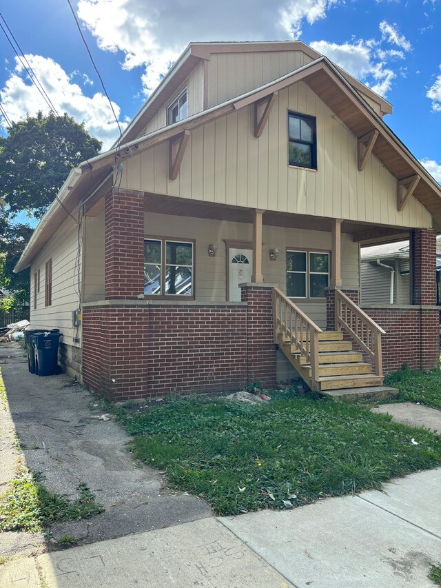 bungalow-style home with a porch