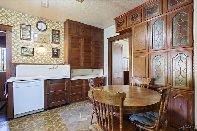 dining area with a textured ceiling