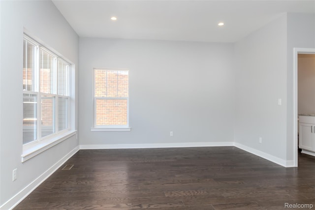 25535 Grandview Ln Unit 30, Novi, MI 48375 - empty room with dark wood-style flooring and recessed lighting