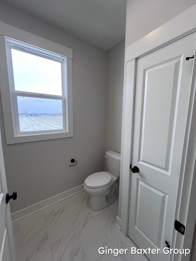 bathroom featuring toilet