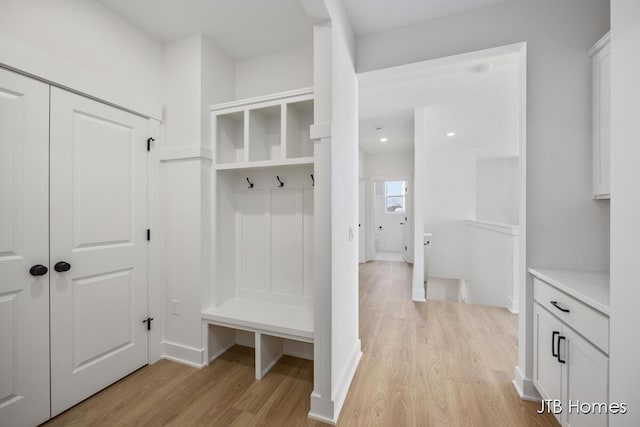 mudroom featuring light wood-style flooring