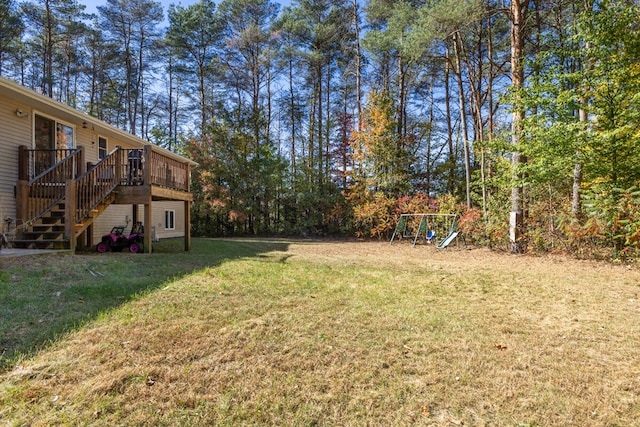 view of yard with a wooden deck