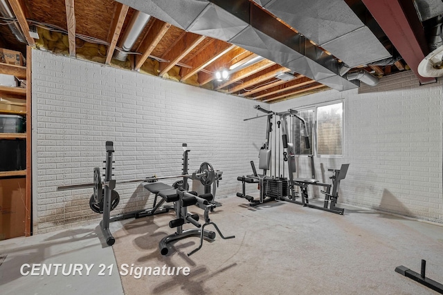 exercise area with brick wall