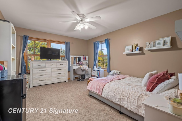 carpeted bedroom featuring ceiling fan