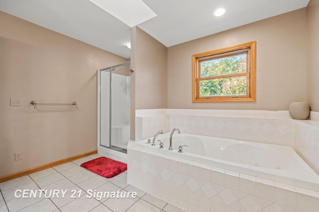 bathroom with tile patterned flooring and plus walk in shower