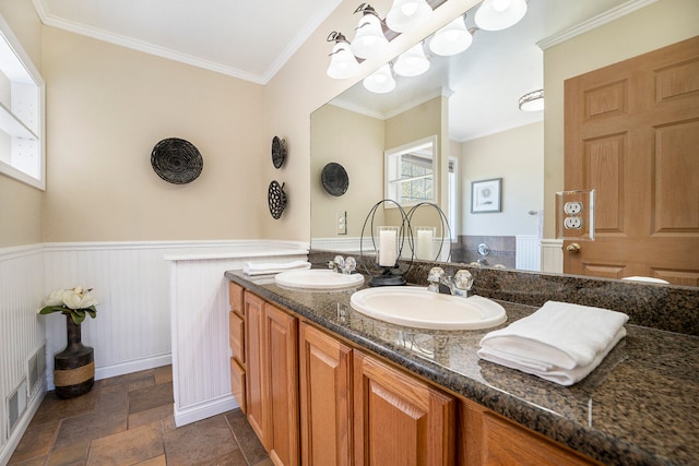 bathroom with vanity and crown molding