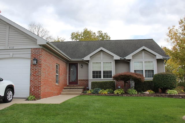 single story home featuring a garage and a front lawn