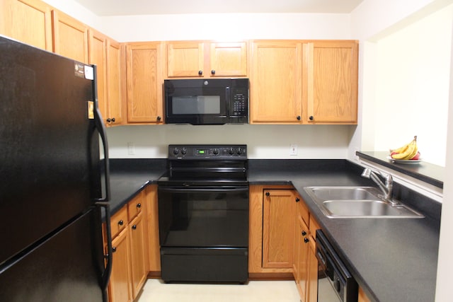 kitchen featuring sink and black appliances