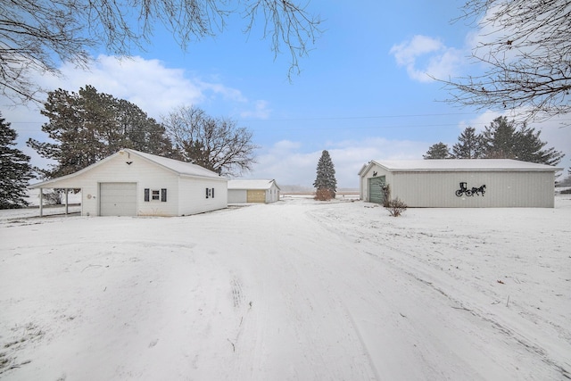 exterior space with an outdoor structure and a garage