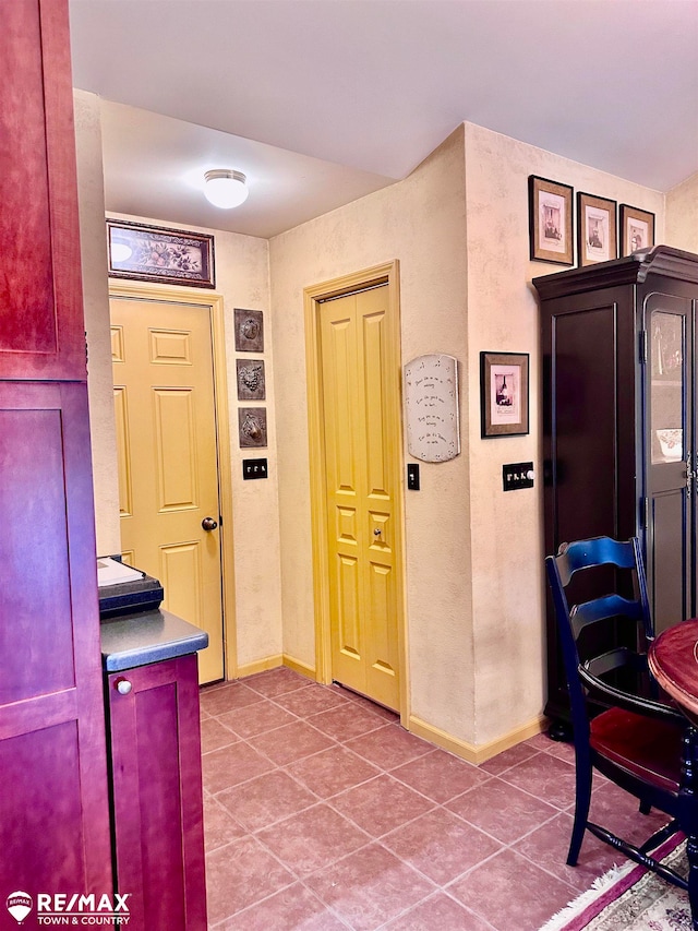 view of tiled foyer entrance