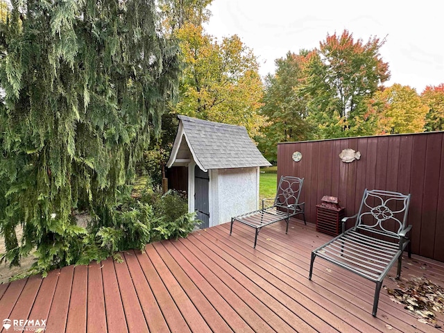 wooden deck with a storage unit