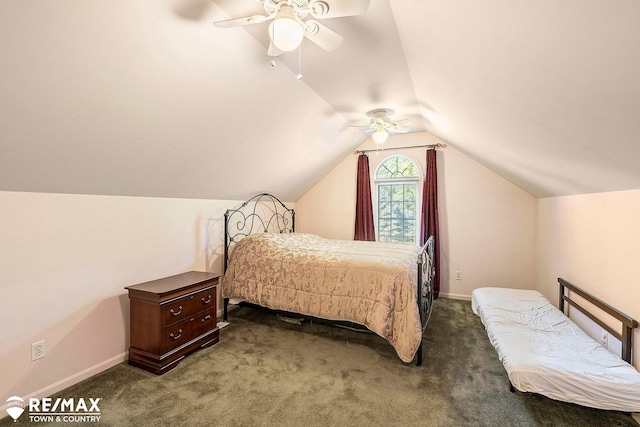 bedroom with dark colored carpet, ceiling fan, and vaulted ceiling