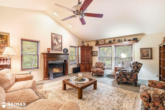 living room with a fireplace, high vaulted ceiling, and ceiling fan