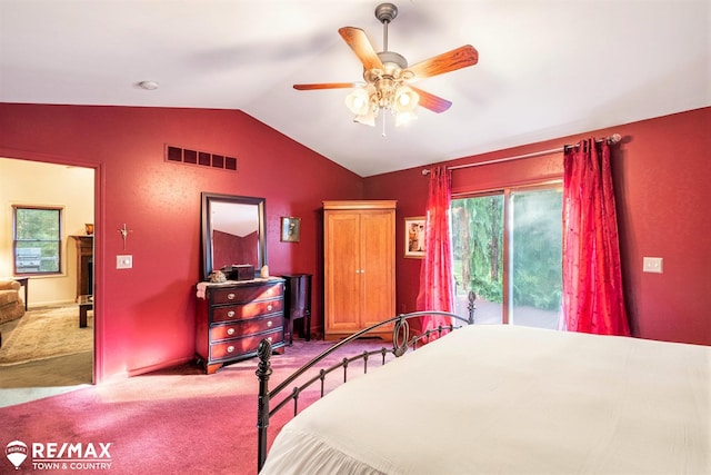 carpeted bedroom featuring access to outside, ceiling fan, and vaulted ceiling