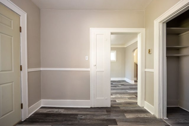 hall featuring dark wood-type flooring