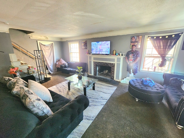 carpeted living room featuring a fireplace and a textured ceiling