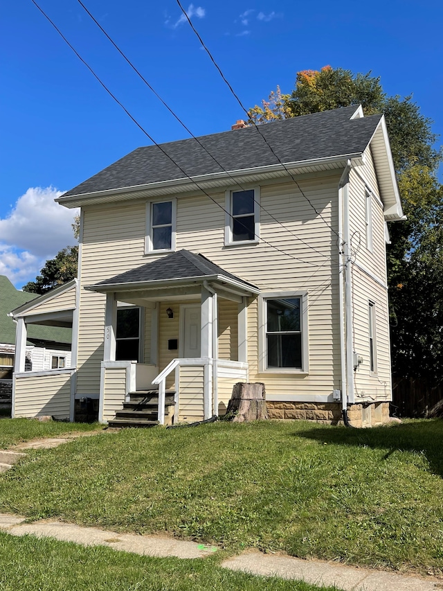 view of front of house with a front lawn