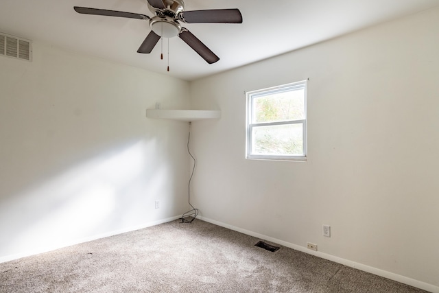 empty room featuring carpet and ceiling fan