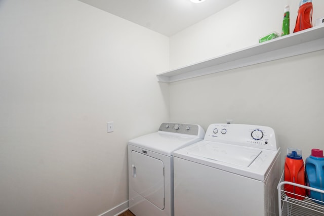 laundry room with washer and clothes dryer