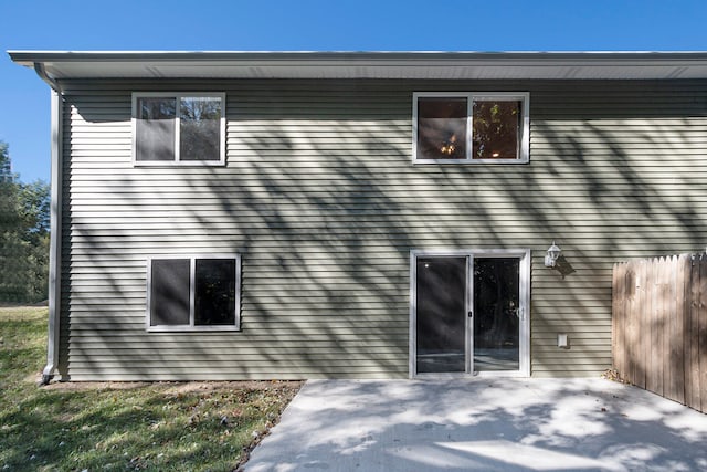 rear view of house featuring a patio