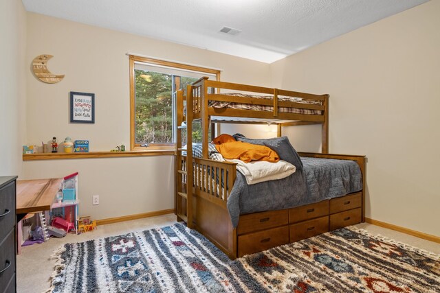 11826 Ridge View Dr, Rapid City, MI 49676 - carpeted bedroom featuring baseboards