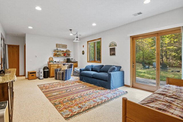 11826 Ridge View Dr, Rapid City, MI 49676 - living area with recessed lighting and light colored carpet