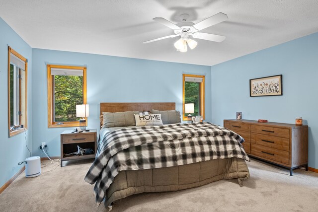 11826 Ridge View Dr, Rapid City, MI 49676 - full bath with toilet, a shower stall, a jetted tub, and tile patterned flooring