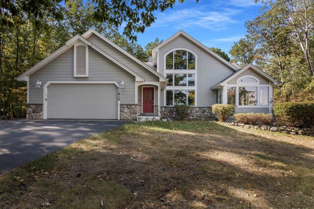 11826 Ridge View Dr, Rapid City, MI 49676 - sunroom / solarium featuring vaulted ceiling and ceiling fan