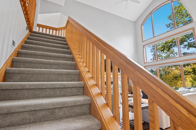 11826 Ridge View Dr, Rapid City, MI 49676 - carpeted home office with lofted ceiling, recessed lighting, baseboards, and a ceiling fan