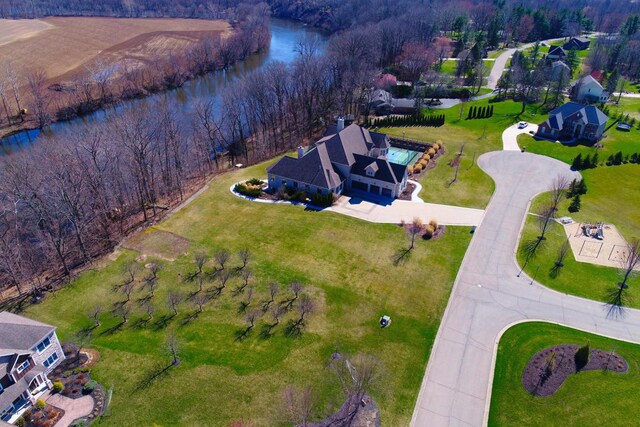 4559 Trails End Path, Saint Joseph, MI 49085 - aerial view of property and surrounding area with a large body of water and a heavily wooded area