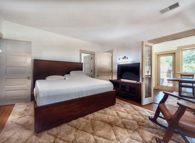 bedroom featuring hardwood / wood-style flooring