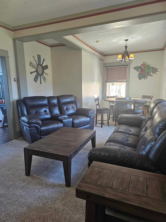 living room featuring carpet flooring, crown molding, and an inviting chandelier