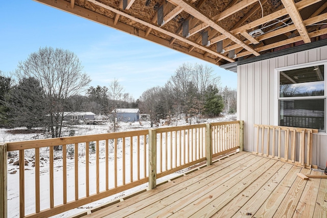 view of snow covered deck