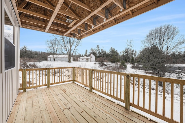 view of snow covered deck