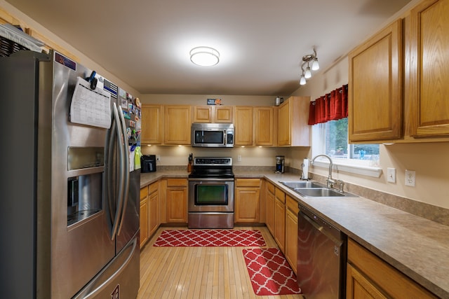 kitchen featuring appliances with stainless steel finishes and sink